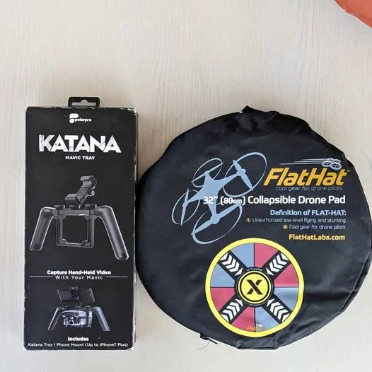 Collapsible 32 in drone landing pad with FlatHat logo and circular graphic