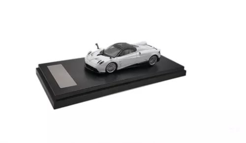 White Pagani Huayra Roadster 1:64 diecast model on display base