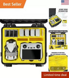 Hard shell drone case with yellow foam insert and compartments for accessories