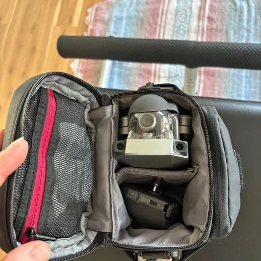 DJI drone accessory case open with drone body and camera module inside