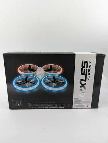 Mini hobby drone in retail box, blue LED ring lights and propellers visible