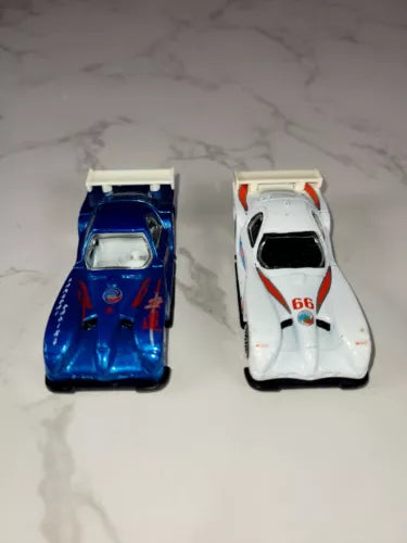 Diecast race car set: blue and white 2 toy cars, detailed front grilles