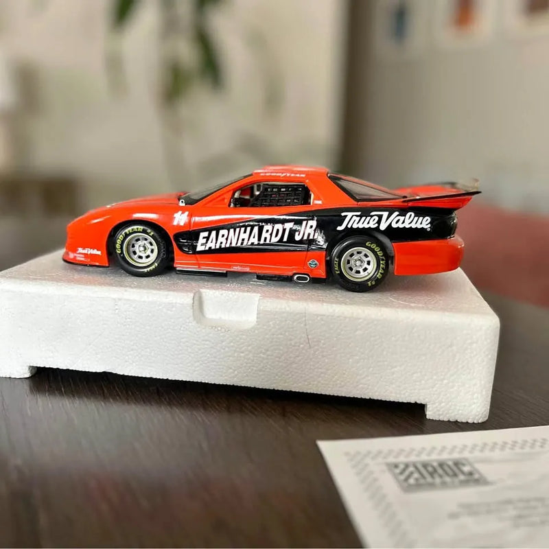 Orange diecast racing car with EARNHARDT JR and TrueValue decals, detailed wheels