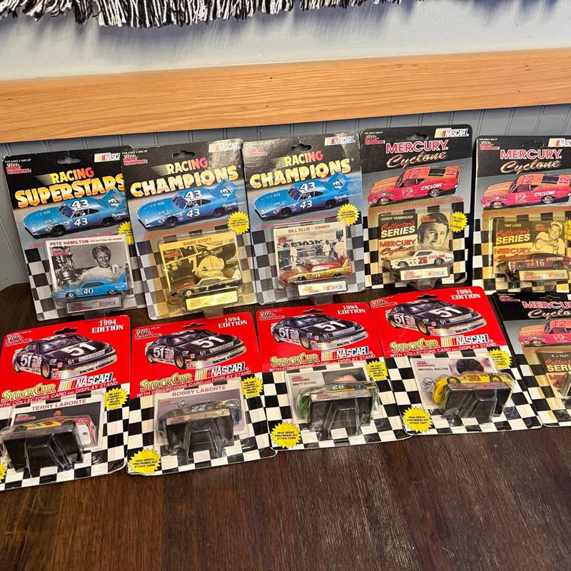 Boxed NASCAR diecast car set with multiple racing cars in retail packages