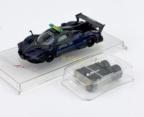 Diecast metal sports car model in dark blue with rear wing and display base