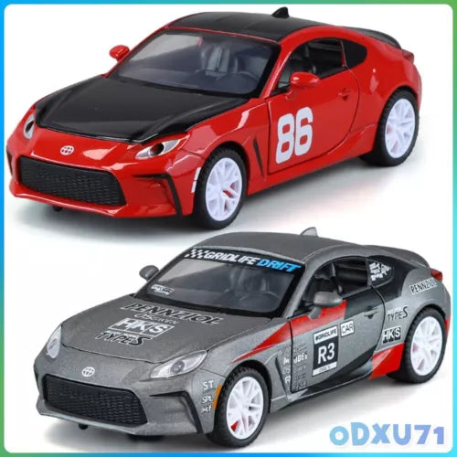 1/32 scale alloy diecast model car, red and dark gray with racing decals and wheels
