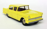 Yellow diecast model car with chrome grille and front bumper detail