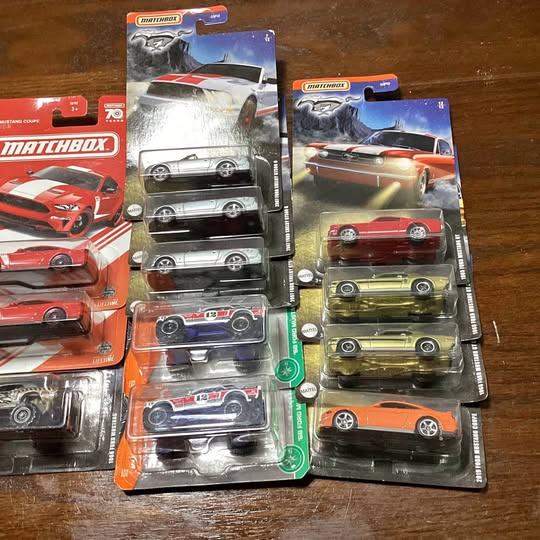 Set of Matchbox diecast Mustang car packs in blister packaging, various colors