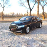 Black 1:18 scale sedan diecast model car, front three-quarter view