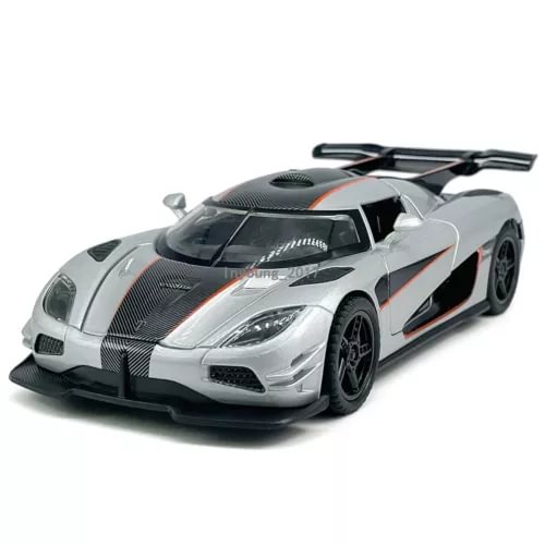 1:32 diecast model car, silver Koenigsegg One:1 with black and orange accents, front 3/4