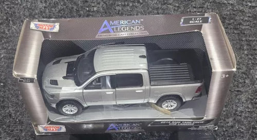Diecast RAM 1500 crew cab Laramie model truck, gray with black accents