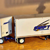 Diecast Swift box trailer with blue logo, white body, and wheels