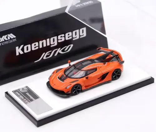 HKM 1:64 orange Koenigsegg Jesko diecast sports car model on display base