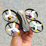 Black youth WiFi quadcopter drone with four propellers and colorful LED lights