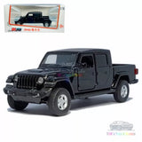 Black 1/36 diecast Jeep Wrangler model car with open grille and side steps