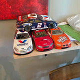 NASCAR diecast metal race car set with blue, red, and orange cars