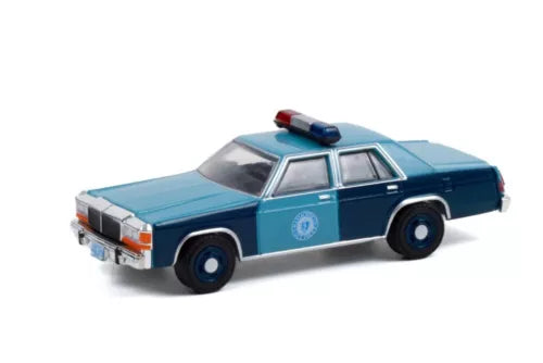 Blue police diecast car with light bar, front three-quarter view, 1/64 scale