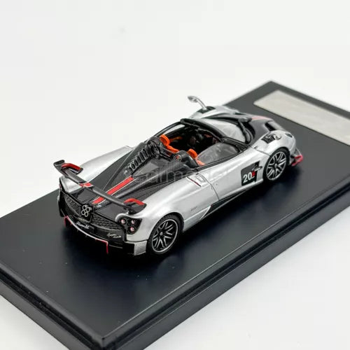 1:64 scale silver sports roadster diecast model car, #20 on black base
