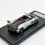 1:64 scale silver sports roadster diecast model car, #20 on black base