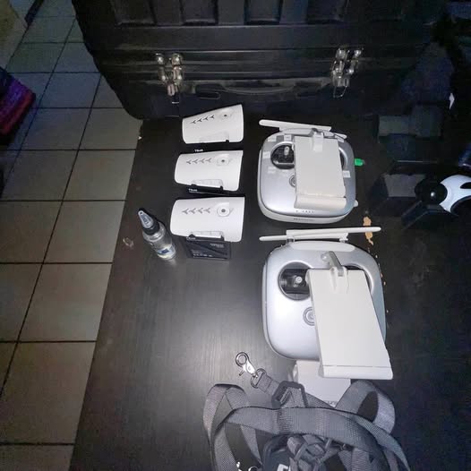 DJI Inspire 1 drone with handheld controller, batteries, and case