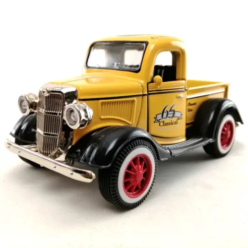Yellow classic die-cast truck model with black fenders and red wheel rims, 1:36 scale
