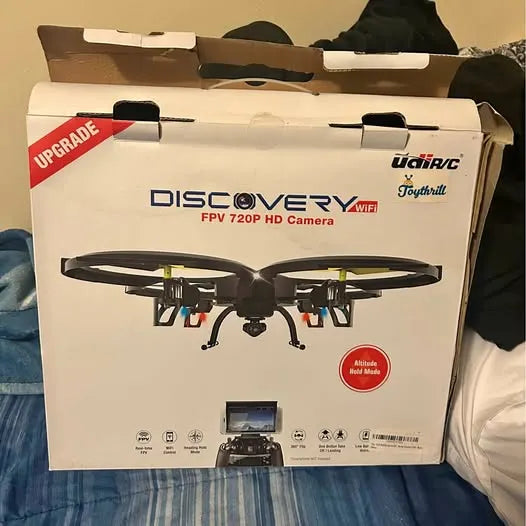 Drone camera kit retail box with white front panel and black drone graphics