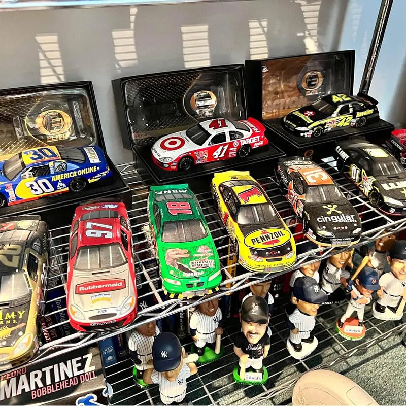 NASCAR diecast car collection, assorted race cars in clear display boxes