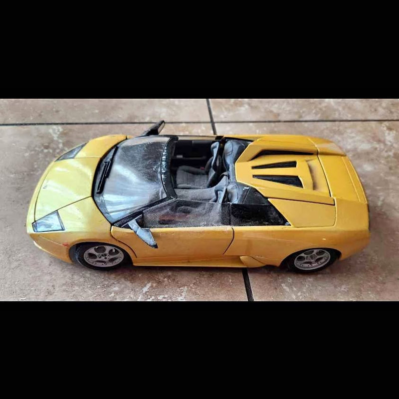1:18 scale Lamborghini diecast sports car, yellow with open cockpit and front details