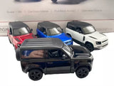 Dark blue diecast metal pull-back SUV toy model with detailed wheels and windows