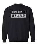 Unisex crewneck sweatshirt in dark with white Drone Hunter New Jersey text