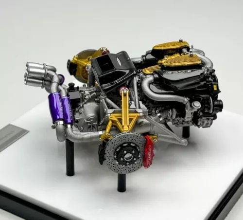 1:18 scale diecast engine display model with black, gold, purple details