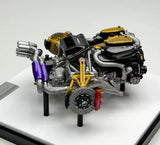 1:18 scale diecast engine display model with black, gold, purple details