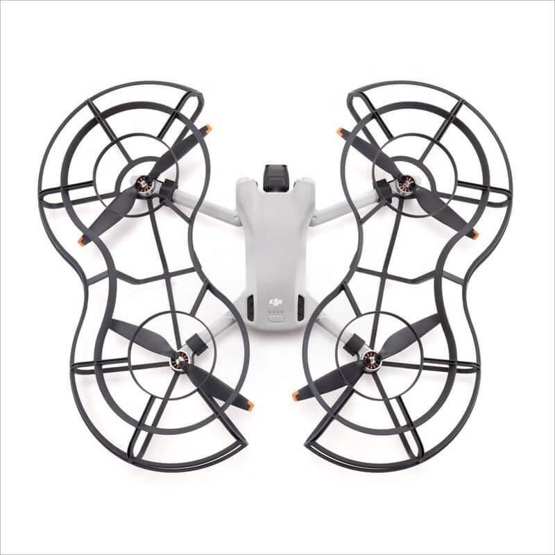 DJI Mini 3 propeller guard set with four black cage guards around rotors