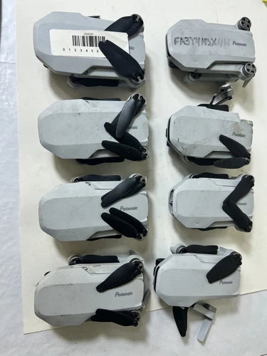 Lot of eight Potensic ATOM SE GPS drone bodies with black propellers, AS-IS parts