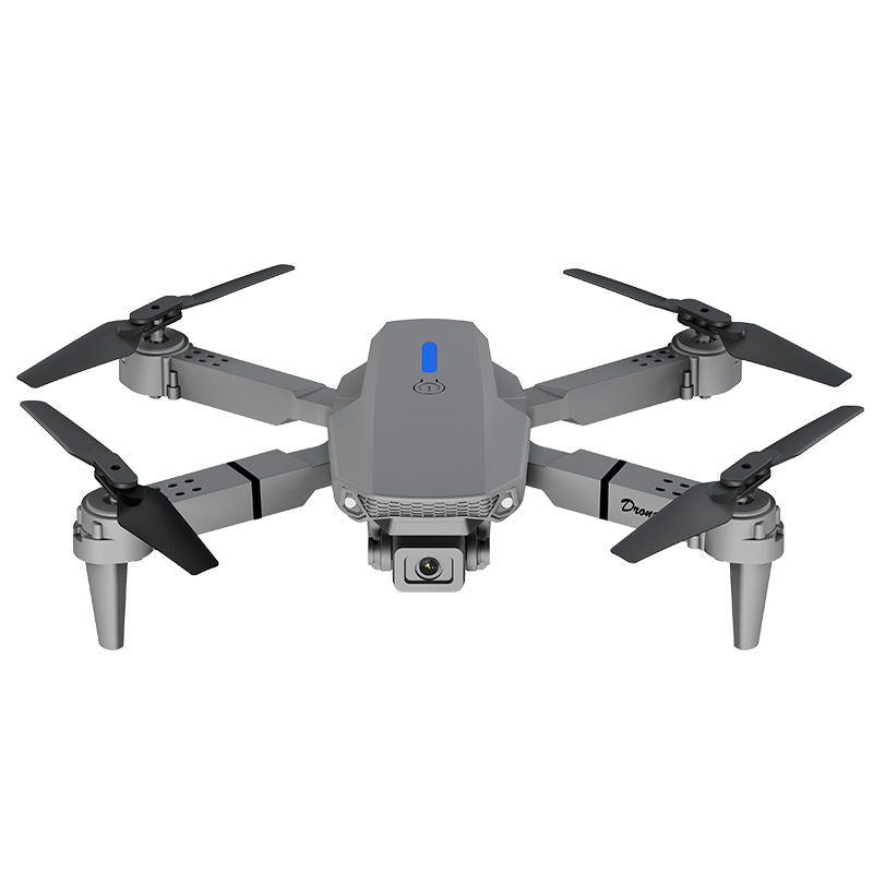 Mini drone with four propellers and front camera, gray body, black blades