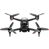 DJI quadcopter drone with front camera and four folding propeller arms