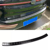 Black rear bumper protector trim with silver edge and white line markings