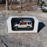 Cadillac Escalade diecast SUV toy, white, in display box