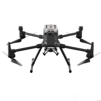 Quadcopter drone with four propellers and central camera module