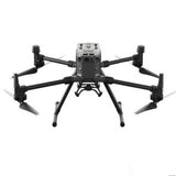 Quadcopter drone with four propellers and central camera module