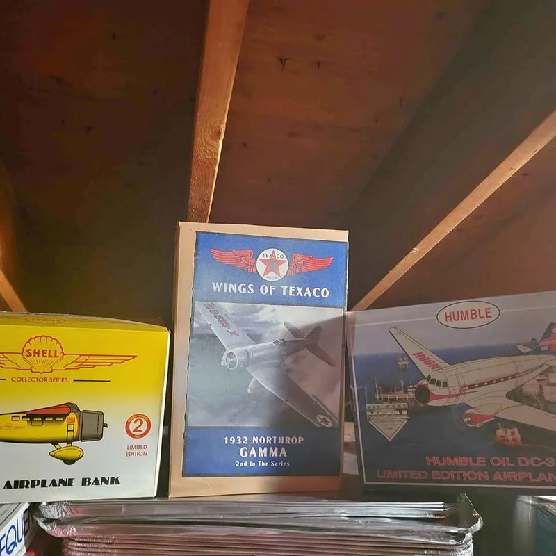 Diecast airplane collectible in retail box with Wings of Texaco design