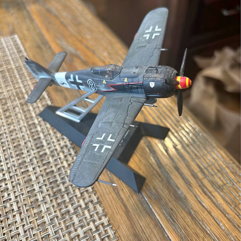 1/72 diecast airplane model with gray fuselage and Luftwaffe markings, propeller and landing gear