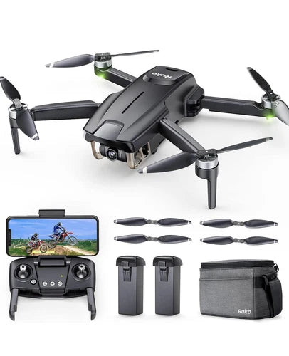 Foldable quadcopter drone with camera, remote controller, spare batteries and case