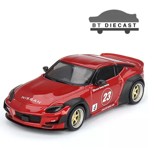 Red Nissan Z Pandem diecast model car with gold wheels and number 23 decal