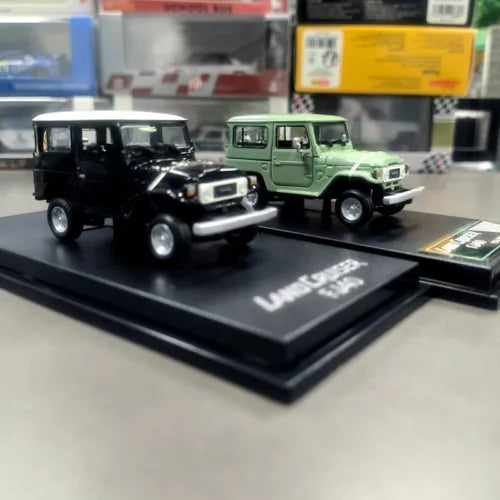 1:64 scale diecast model car, black and green Land Cruiser FJ40
