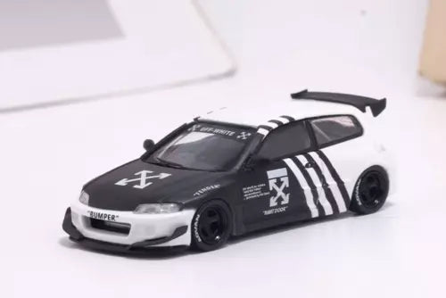1:64 diecast metal sports car toy, black and white with racing stripes and rear spoiler