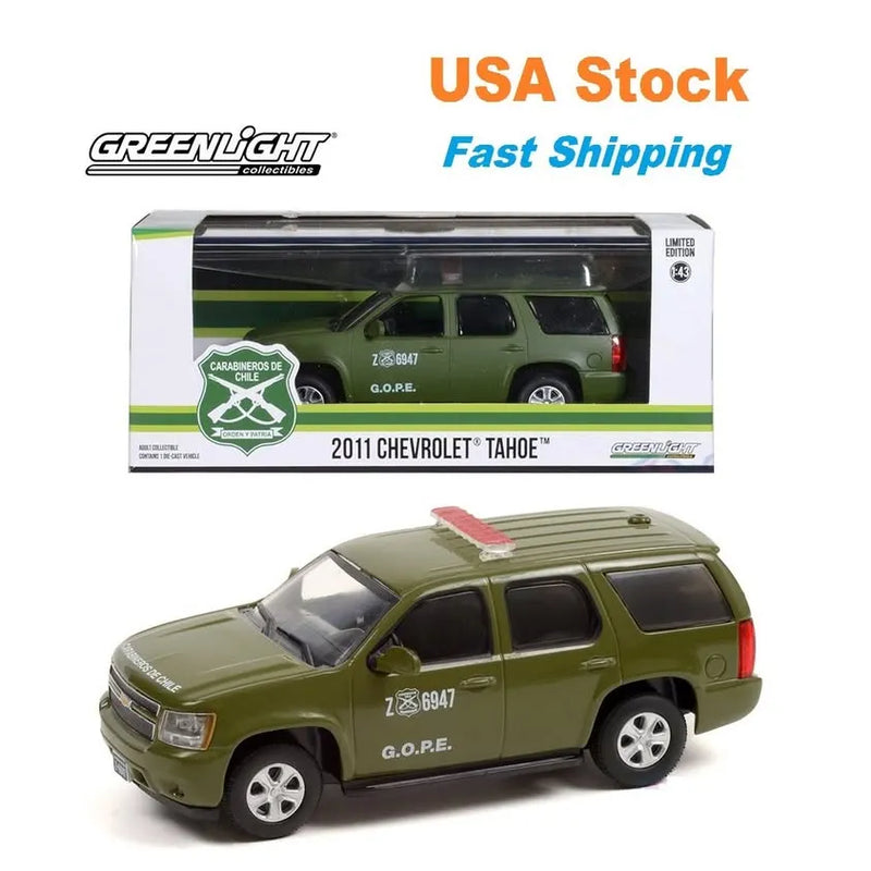 Diecast 1:43 police SUV model, olive green, shown in retail display box