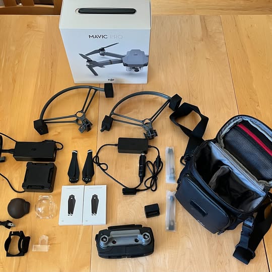 Mavic Pro drone accessory kit with hard case, propellers, cables, and charger