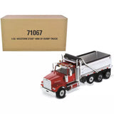 Red and silver diecast dump truck model with open bed and three-axle rear
