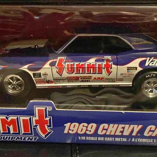 1969 Chevrolet Camaro 1:18 diecast model car with Summit Racing branding, blue and red